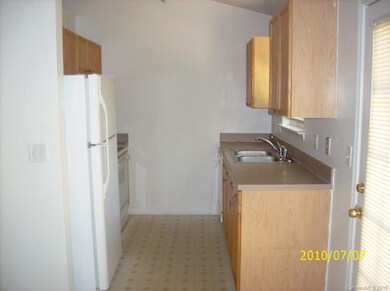 Photo of Eargle kitchen area equipped with refrige