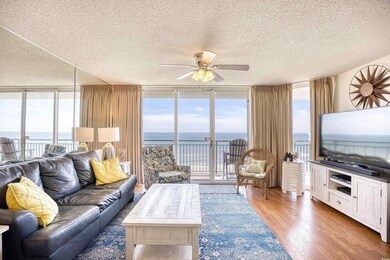 Living room with a wealth of natural light, hardwo