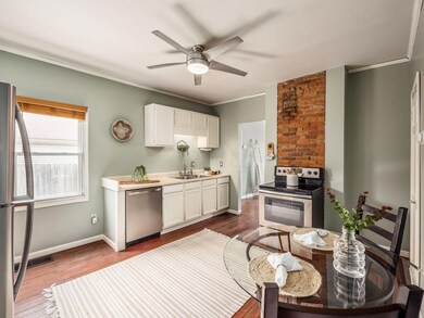 Brick accent and ceiling fans