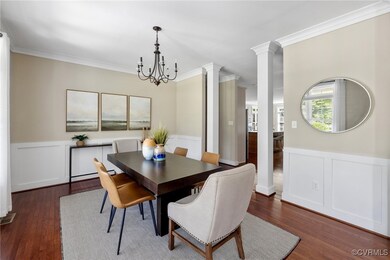 Dining space featuring an inviting chandelier, dec