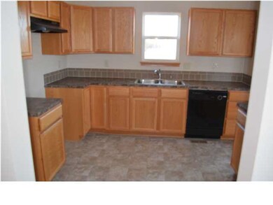 Kitchen with dishwasher and oven