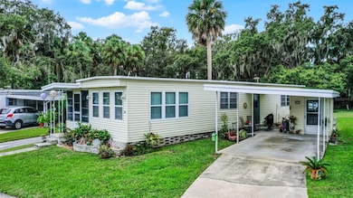 9 Cocos Plumosa Dr unit A, Eustis, FL 32726 - photo 2