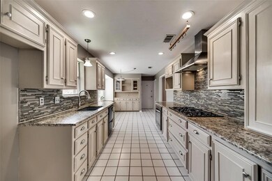 Kitchen offers updated appliances and designer bac