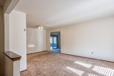 Looking into the living room from the door as you 