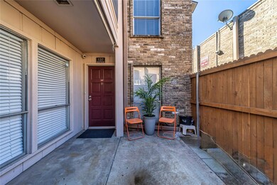 Property entrance featuring a patio area