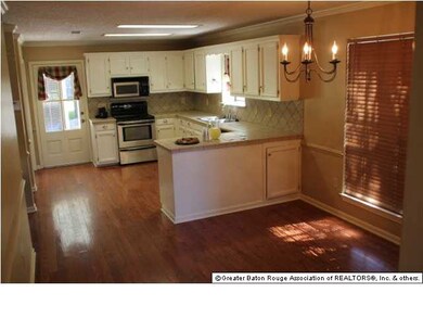 kitchen, desk, and dining area