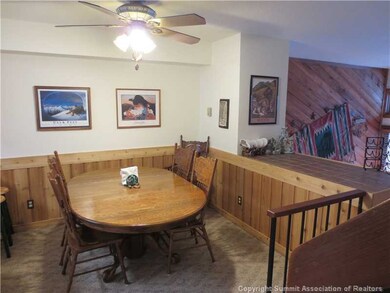 Dining Room. Lots of dining space in a cozy, wood-