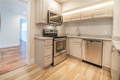 Kitchen is off the dining space and has all new st