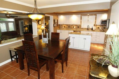 Connected to kitchen.  This large room can seat 8 