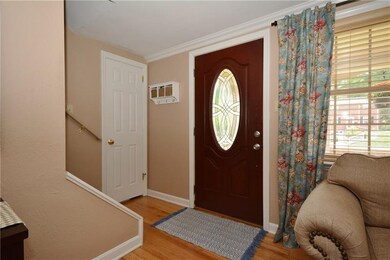 The front entry offers a guest coat closet.