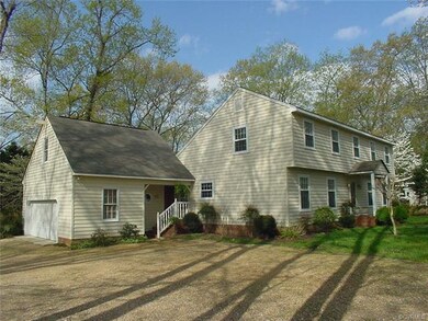 Side view w 2 car garage and loads of parking
