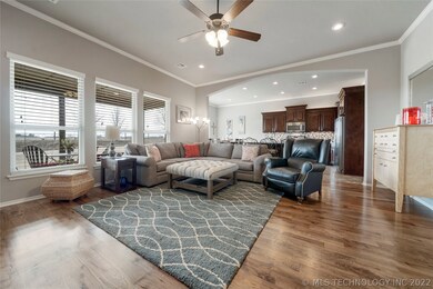 Wall of windows with pasture views. Recessed light