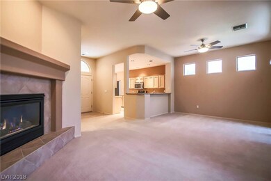 Open floor plan features fireplace and 10' ceiling