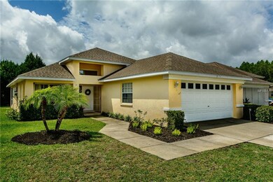 Beautiful landscaping surrounds the house