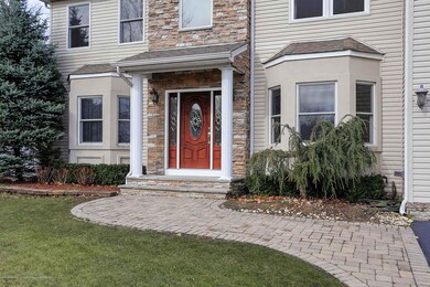 FRONT DOOR ENTRY WITH PAVER WALKWAY