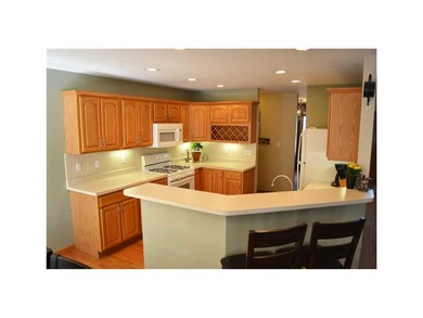 Kitchen. Kitchen with hardwood floors, tile backsp