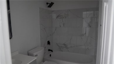 Full bath with shower / tub combination and vanity