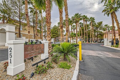 Community / neighborhood sign with a gate and a re