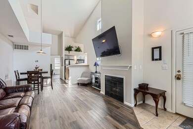 Open living room with high vaulted ceiling