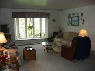 Living Room. LARGE BAY WINDOW LETS IN LOTS OF NATU