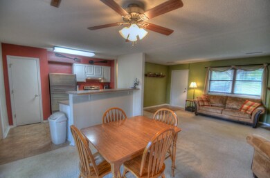 Dining looking to Kitchen & Living