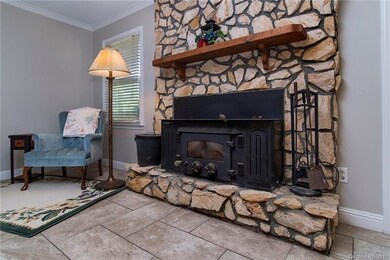 Lovely stone wood burning fireplace...