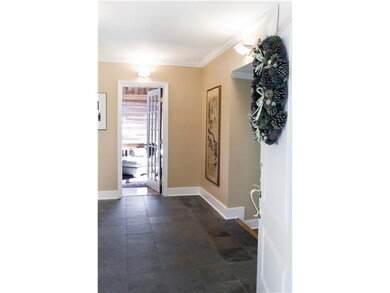 Entry/Foyer. Pretty slate flooring and warm colors
