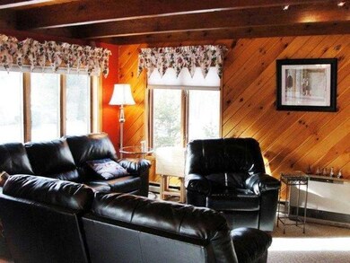 Living Room. Natural wood ceiling...
