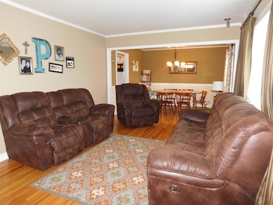 living room has hardwood floors