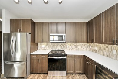 Photos are not of actual units, similar floor plan finishes, verify dimensions