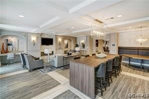 Community lobby with coffered ceiling, recessed li