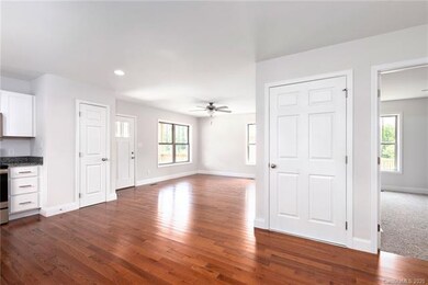 Open floor plan connecting main living areas.