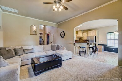 Living room opens to the eat-in kitchen