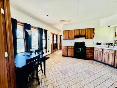 87 Cobbossee Ave, Gardiner, ME 04345 - photo 5