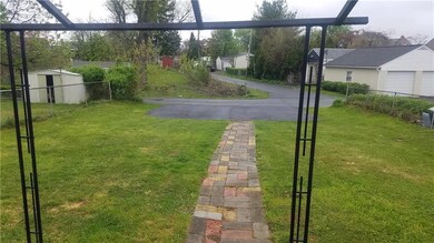 3 car parking pad in rear with a wide yard