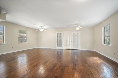 Family room with a wealth of natural light, ceilin