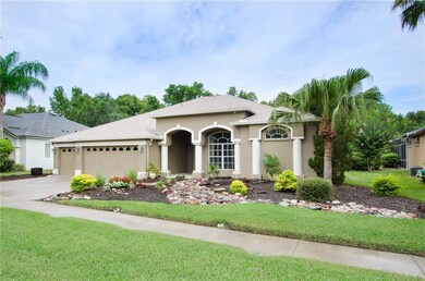 Front of home with pristine landscaping. Private l
