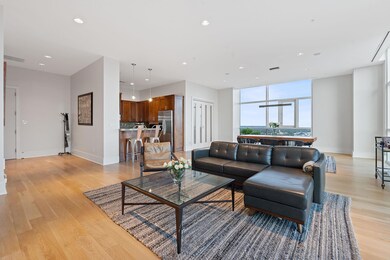 Living room featuring baseboards, visible vents, 