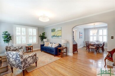 Living room opens to the formal dining room...did 