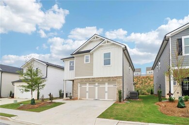 Craftsman-style home with board and batten siding,