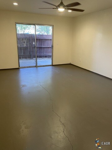 Living Room with Sliding Door Access to small back