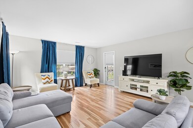 Living area with a healthy amount of sunlight and 