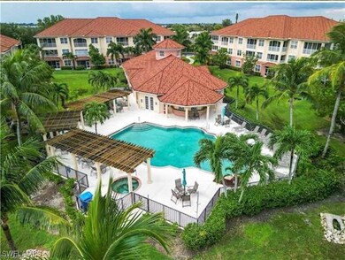 View of pool with a pergola and a patio area