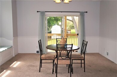 Dining room with sliding glass doors that lead to 