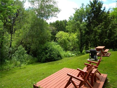 OVERLOOKING A LUSH BACKYARD