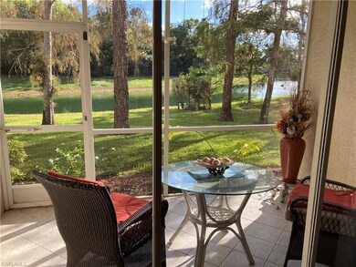 Sunroom / solarium featuring a water view