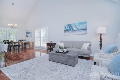 Open and spacious living area with cathedral ceili
