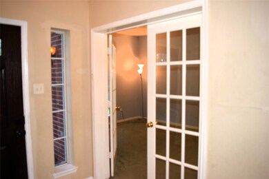 French doors open to private study off the two sto