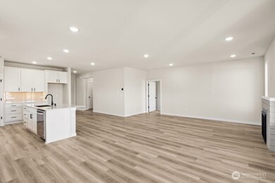 Photos are a completed home of the same floorplan.