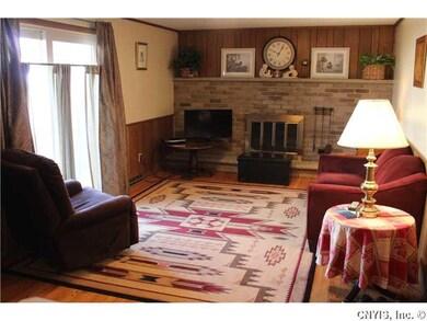 Family Room. With pegged oak floors, wood burning 